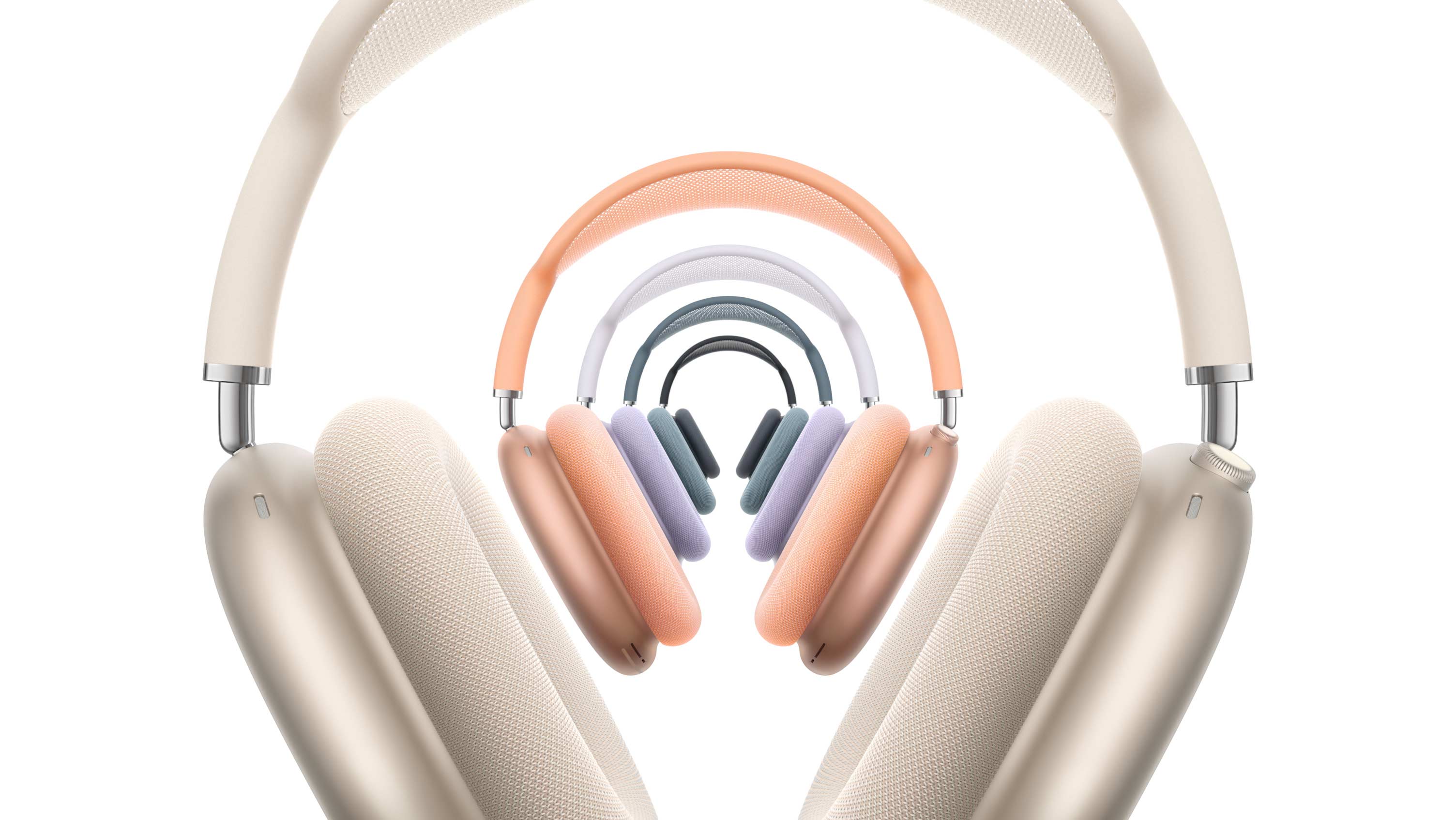 重ねて配置されたスターライト、オレンジ、パープル、ブルー、ミッドナイトの5つのAirPods Max 2ヘッドフォンの前面の外観