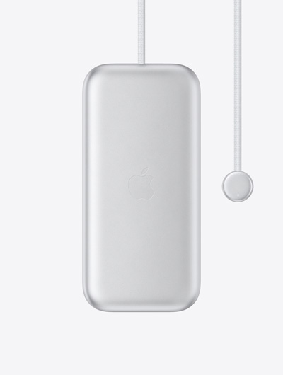 Apple Vision Proのバッテリーの外観。中央にAppleのロゴ、内蔵された電源ケーブルの一端に丸いコネクタ、コネクタ上にLEDインジケータがある