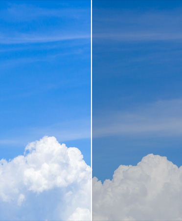 空に浮かんだ雲の2分割イメージ。カラーグレーディングツールの使用前と使用後を示している