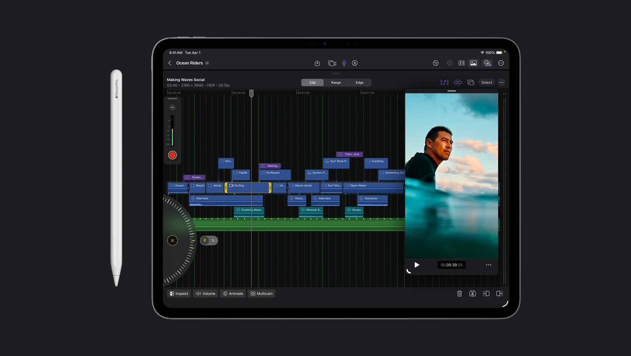 13インチiPad Proの画面に、色で整理されたビデオクリップが表示されている。右側に海に佇むサーファーの画像が表示されている。デバイスの左側にApple Pencilが置かれている