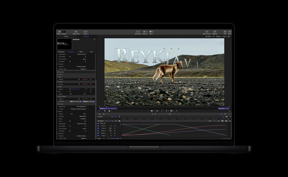16インチMacBook Pro、荒涼とした風景にいるオオカミ、テキストアニメーションのデモ